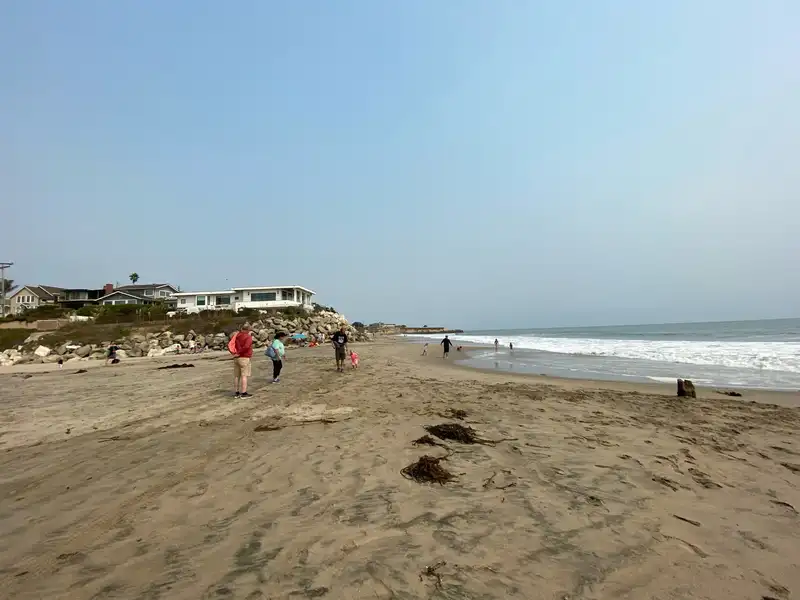 A family beach day in Santa Cruz with Juni, her grandmother, grandfather, and Uncle Ray